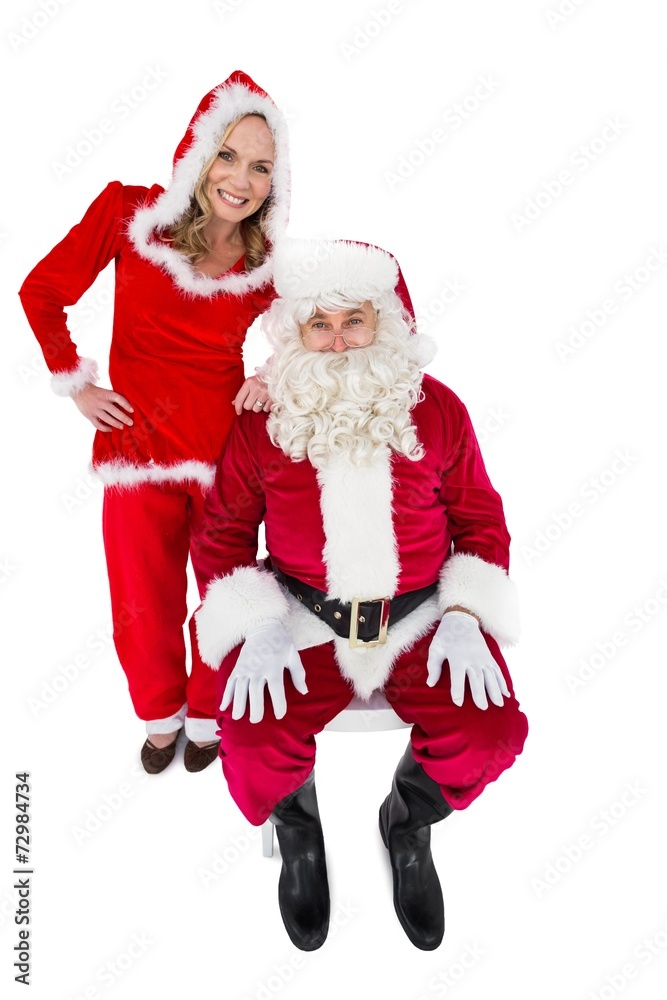 Santa and Mrs Claus smiling at camera