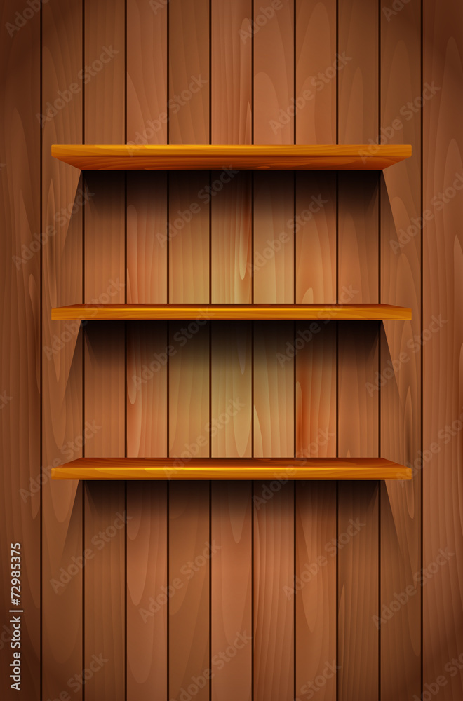 Three wooden shelves on the wooden background