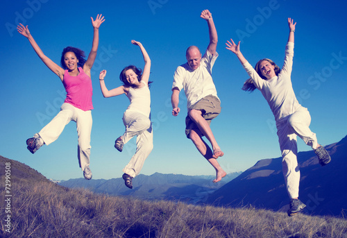 Group of People Jumping Happines Outdoors Concept