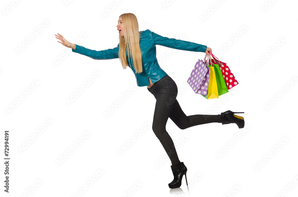 Fototapeta premium Woman with shopping bags isolated on white