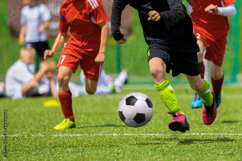 Football soccer game. Running players © matimix