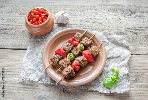 Grilled beef skewers with pepper and brussels