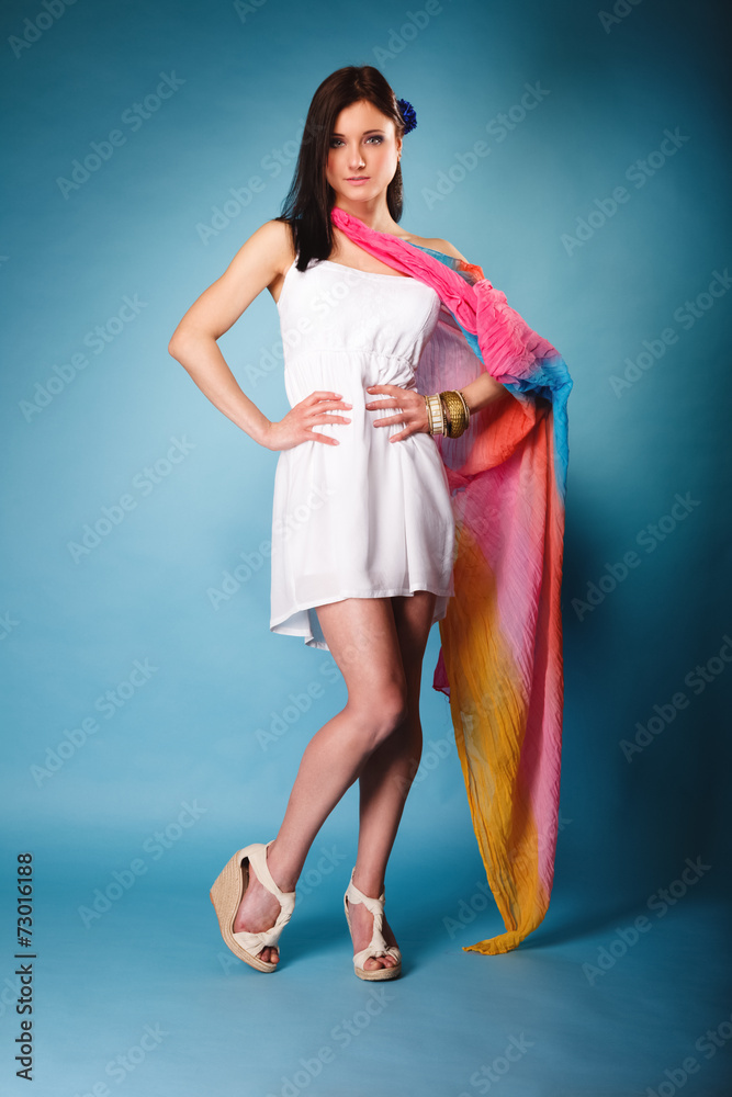 summer woman with colored shawl on blue summer woman with colored shawl on blue