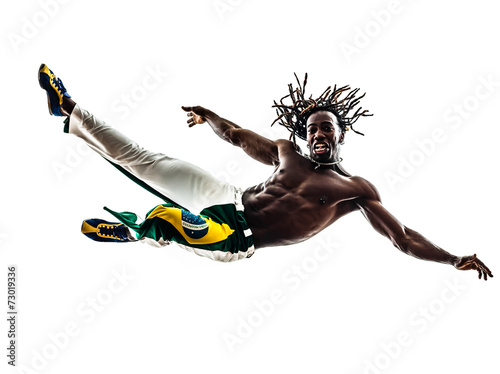Brazilian black man jumping dancing capoeira dancer silhouett