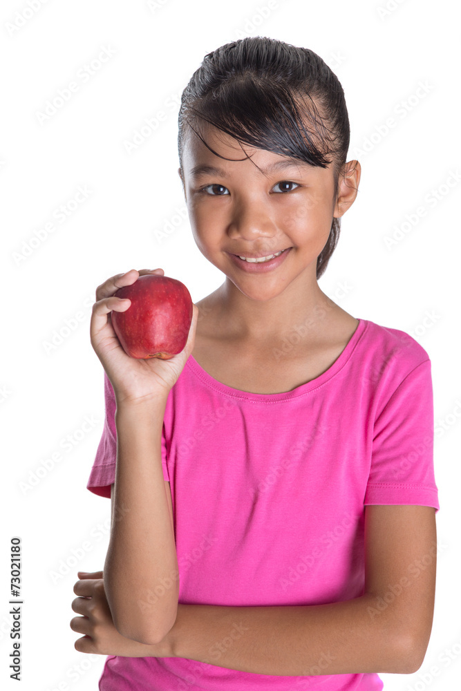 Young Asian Malay teenager with a red apple