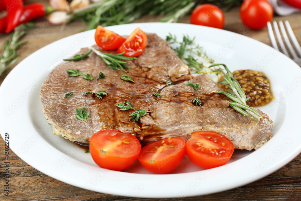 Delicious grilled meat on table