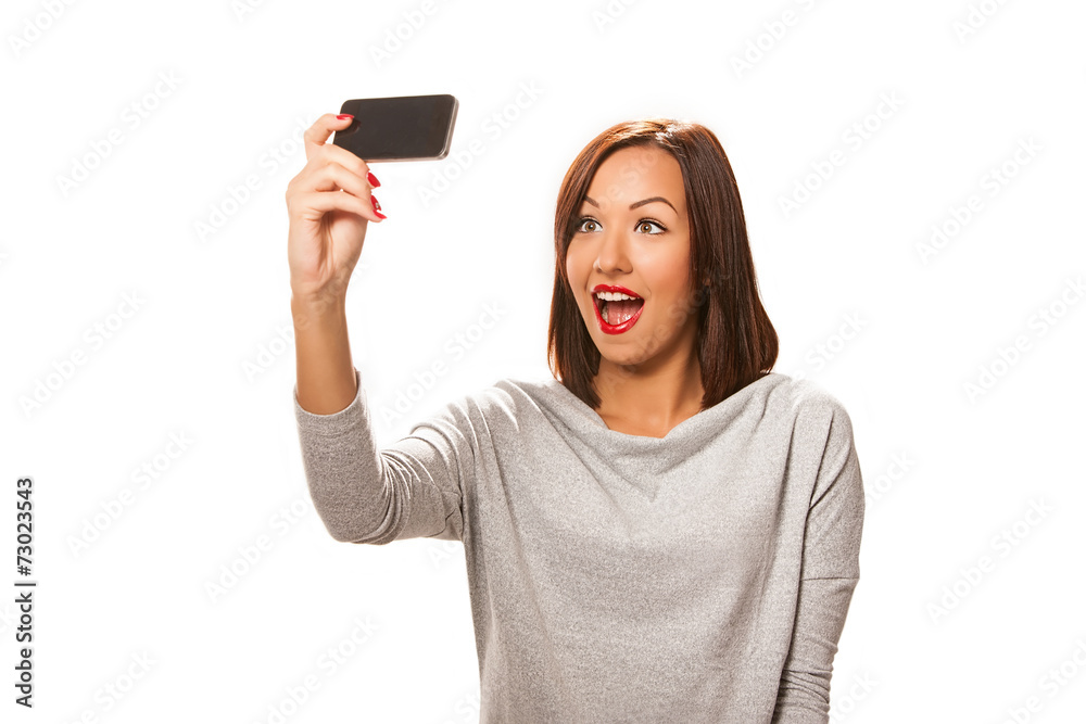 Beautiful young woman taking selfie. Beautiful young woman taking selfie.