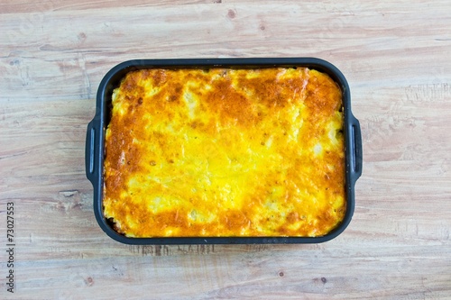 Potato casserole with eggs and meat. Horizontal image