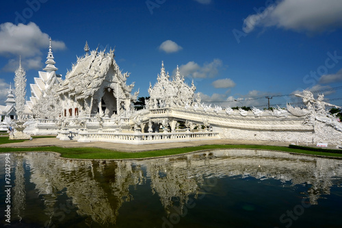 Rongkhun White Temple Chiang Rai Province and reflection on wate photo