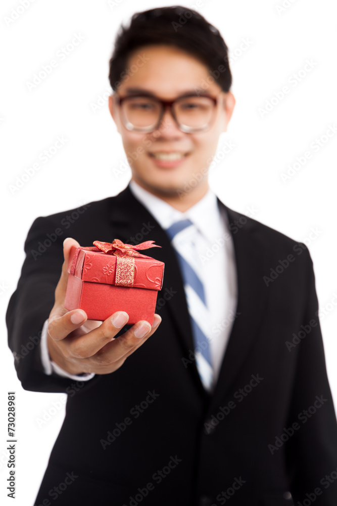 Asian businessman with red gift box focus on box Asian businessman with red gift box focus on box