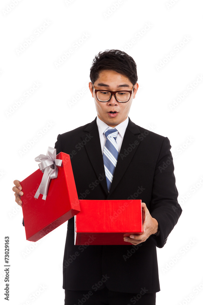 Asian businessman surprise open red gift box Asian businessman surprise open red gift box