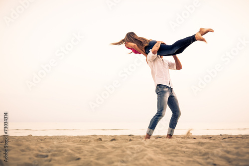 Beautiful Couple having fun on beach