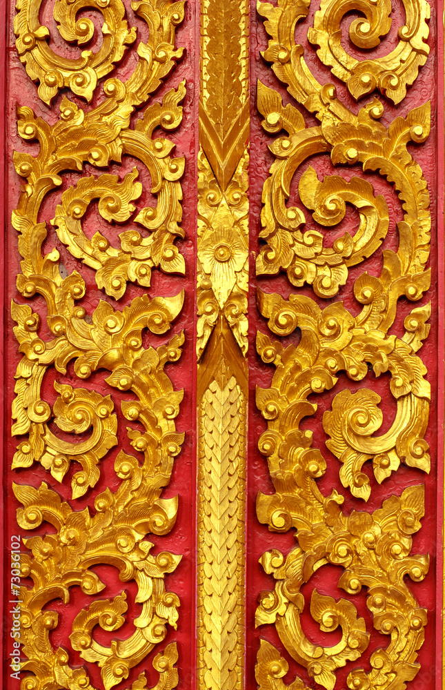 Door wood carving in temple, Thailand