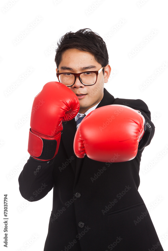 Asian businessman with red boxing glove Asian businessman with red boxing glove