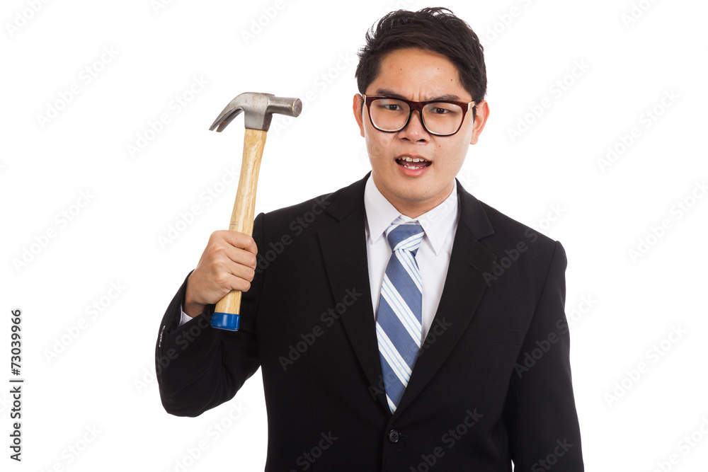 Asian businessman angry with hammer Asian businessman angry with hammer