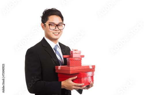 Asian businessman with many gift boxes