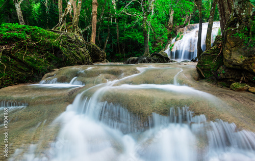 Waterfall in deep tropical forest at Erawan National Park