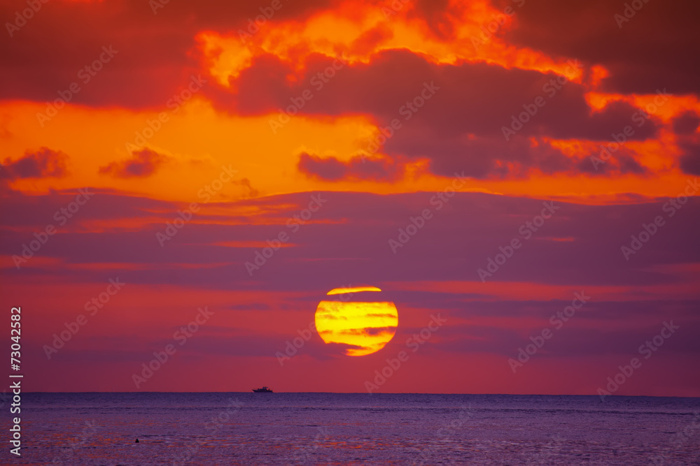 boat under a scenic sunset with clouds boat under a scenic sunset with clouds