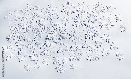 Paper snowflakes on white background
