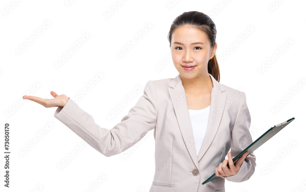 Businesswoman with clipboard and open hand palm Businesswoman with clipboard and open hand palm