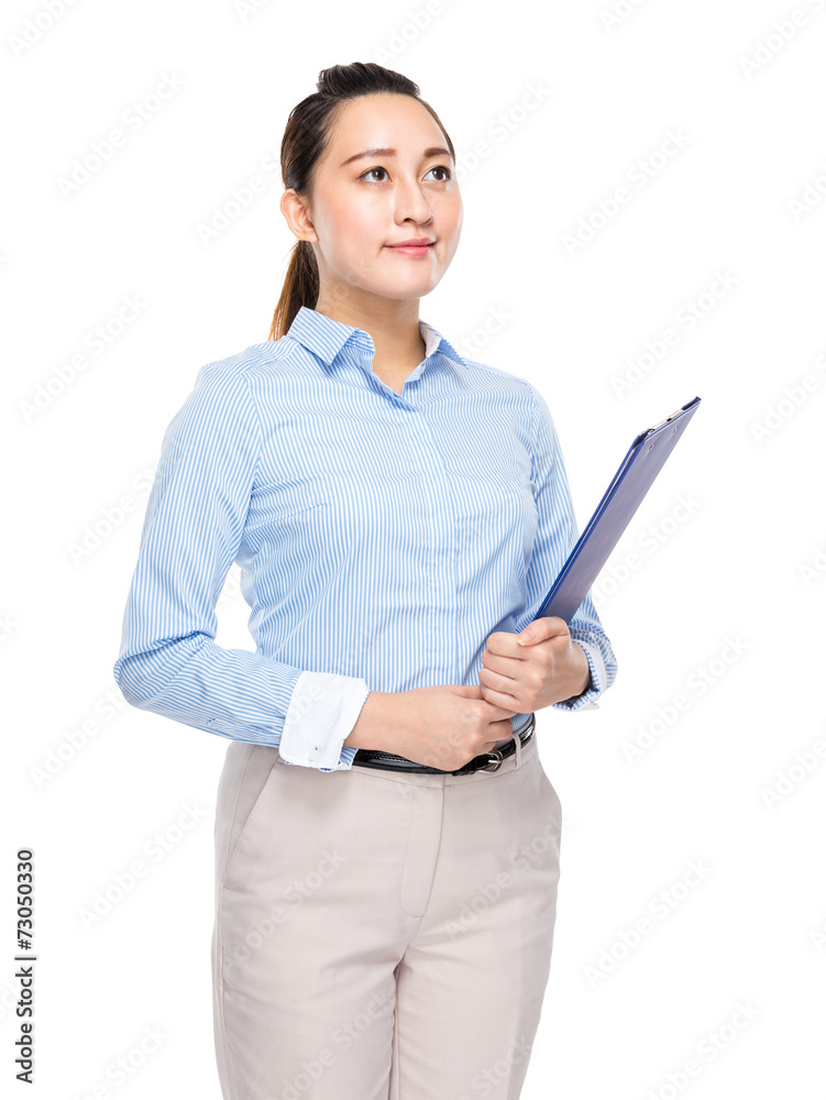 Businesswoman with clipboard and look away Businesswoman with clipboard and look away
