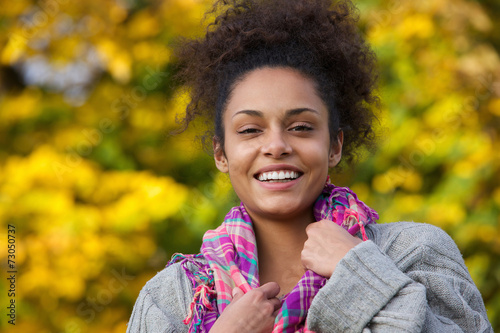 Attractive young african american woman smiling in autumn