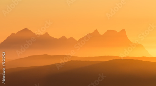 mountains with sun and haze