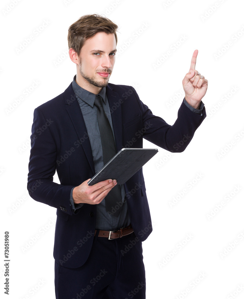Businessman use of digital tablet and finger point up Businessman use of digital tablet and finger point up