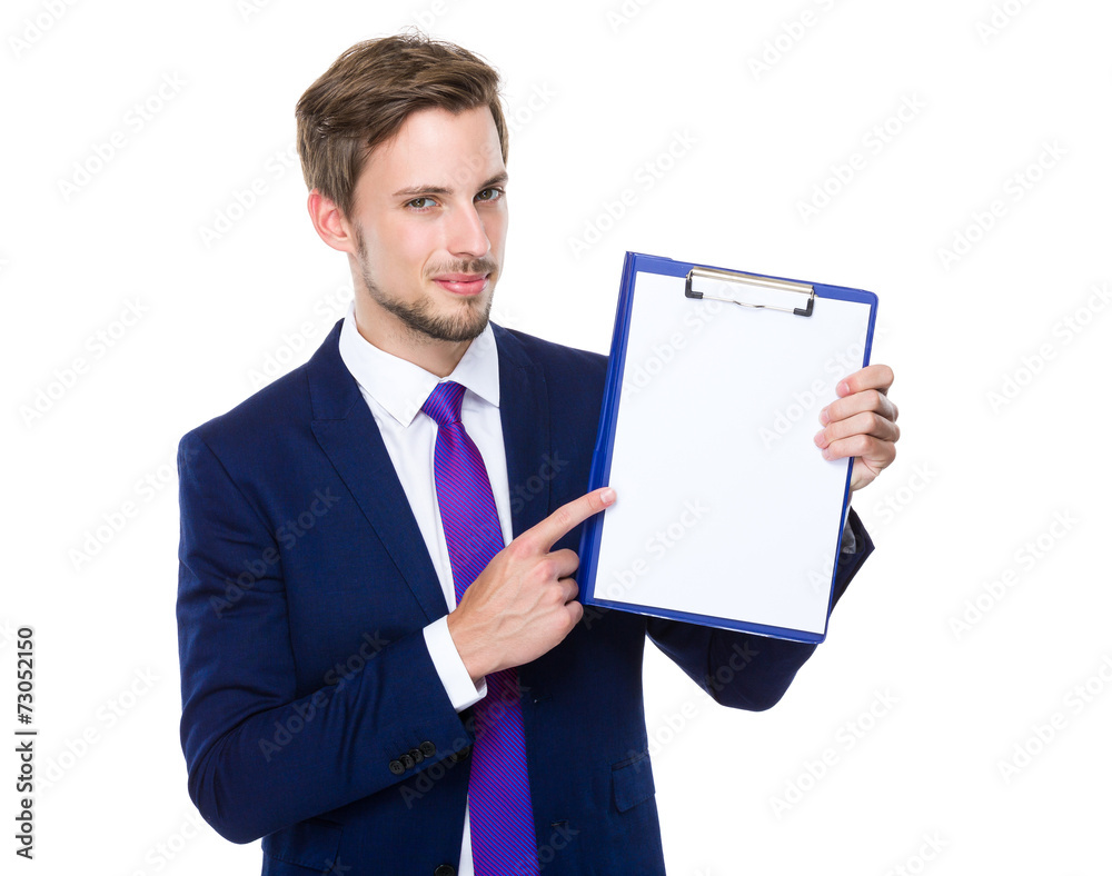 Businessman finger point to white paper of clipboard Businessman finger point to white paper of clipboard
