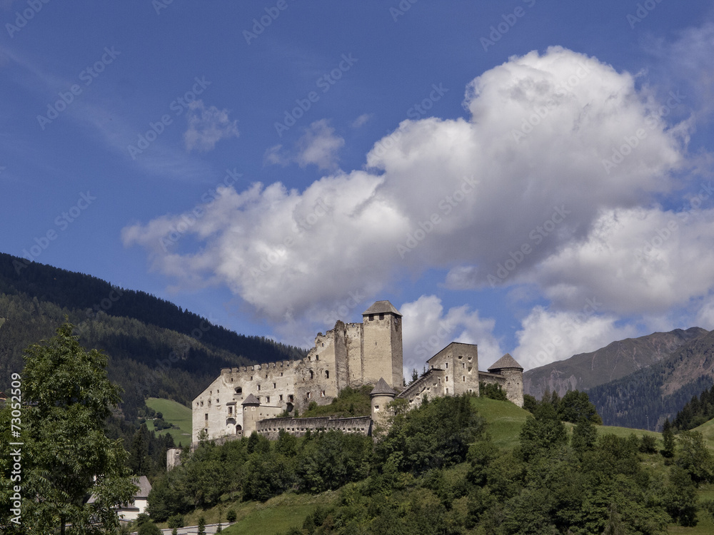 Old castle on a hill in a sunny day of Summer, Austria