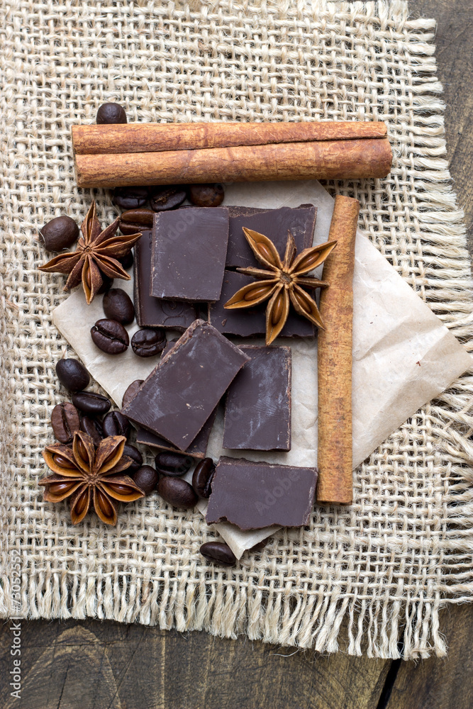 Chocolate crumbs, star anise and cinnamon sticks. Chocolate crumbs, star anise and cinnamon sticks.