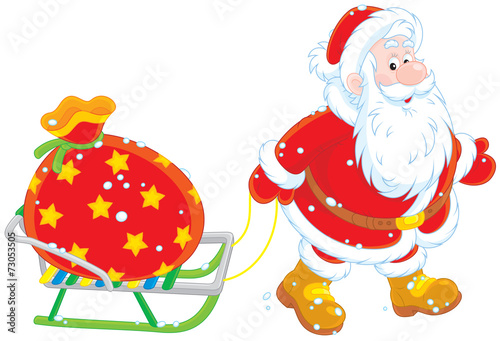 Santa carrying a bag of Christmas gifts on a sledge