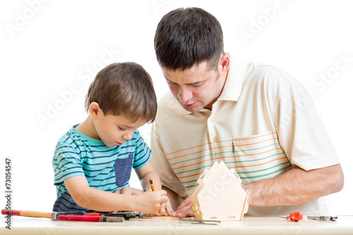 Father and son work together