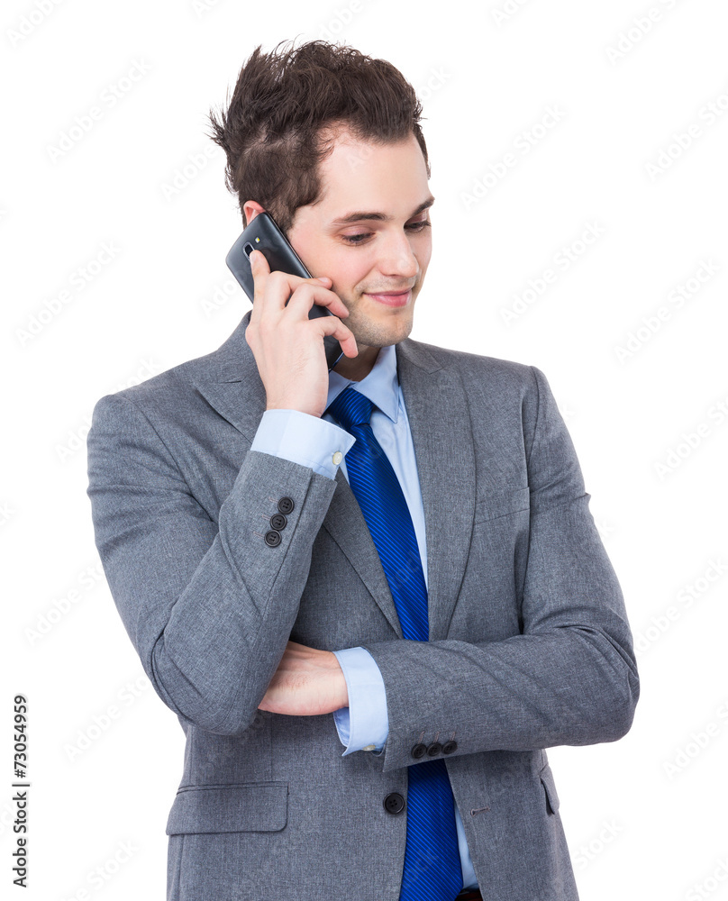 Businessman talk to mobile phone Businessman talk to mobile phone