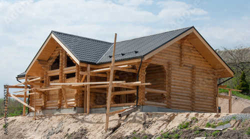 Wooden house construction of the boards © kostyushinay