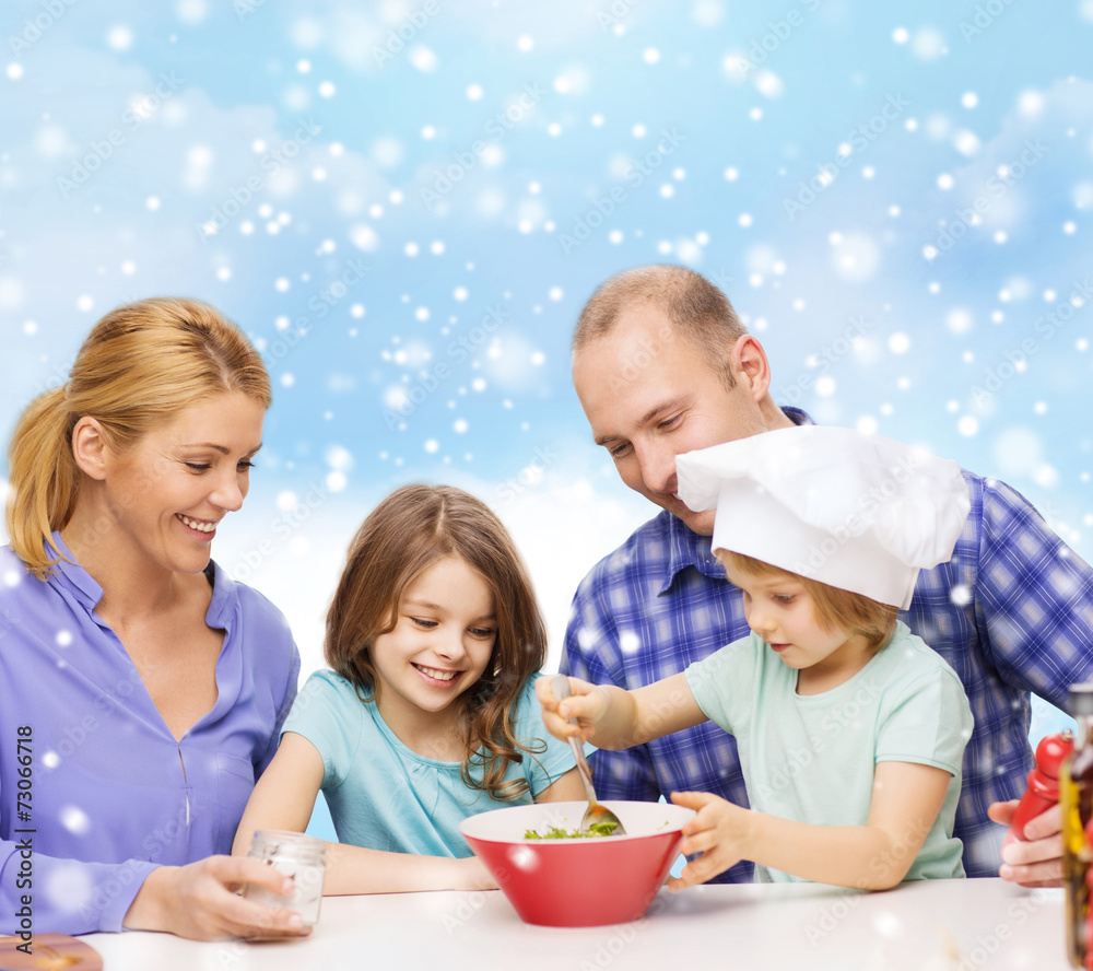 happy family with two kids making salad at home happy family with two kids making salad at home