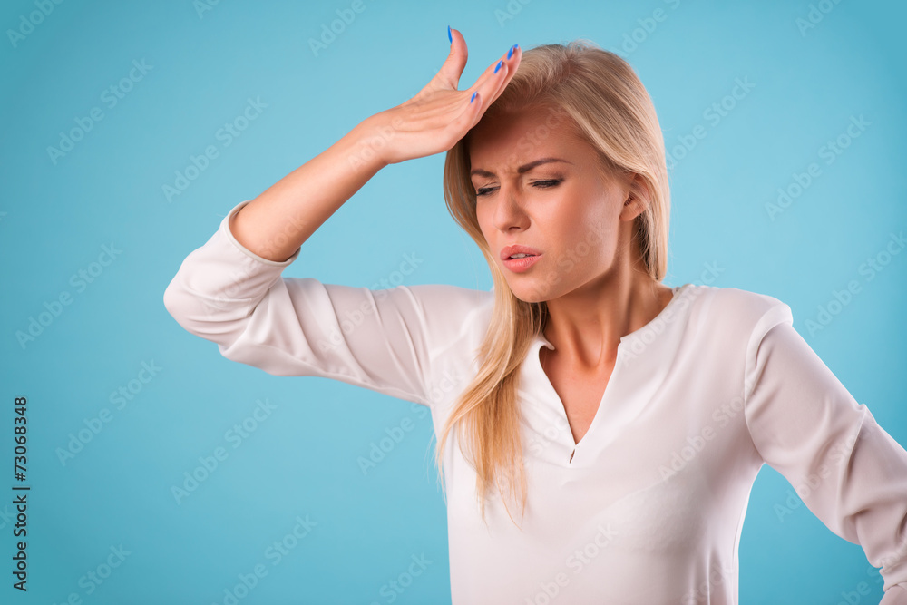 Fototapeta premium Lovely blonde wearing white blouse