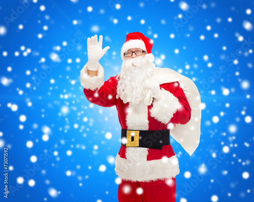 man in costume of santa claus with bag © Syda Productions