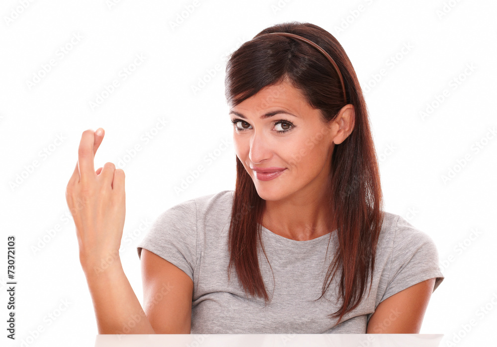 Attractive young girl crossing her fingers Attractive young girl crossing her fingers