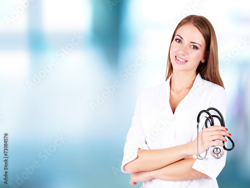Young beautiful doctor on h...