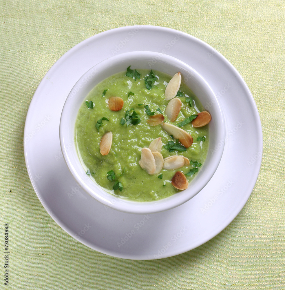 Pea soup with toasted almonds - obrazy, fototapety, plakaty 