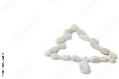white pebbles on a white background in the form of spruce
