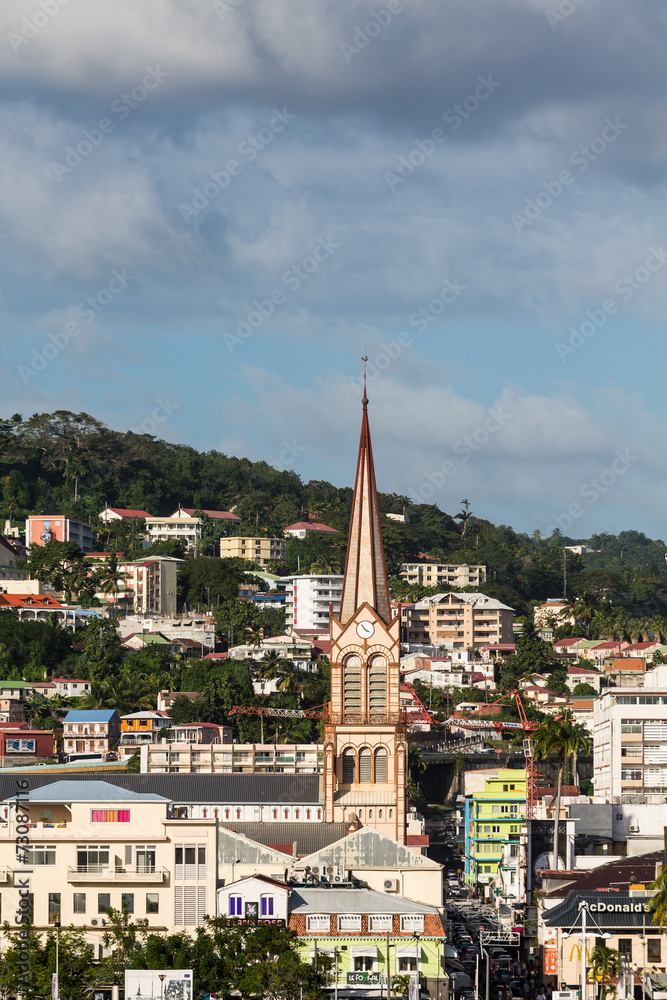 Brown Church Among Colorful Martinique Buildings