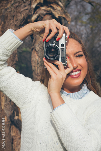 Girl with old camera