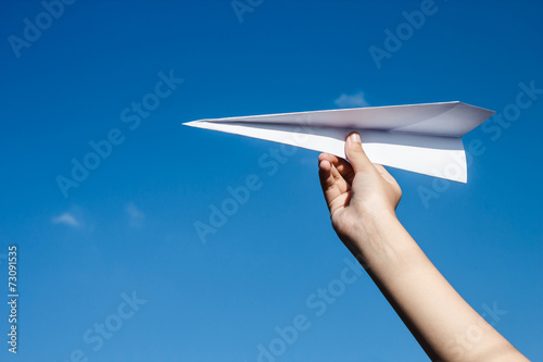 Paper airplane and blue sky.