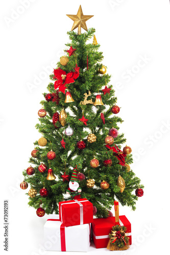 Christmas-tree with multitude of decorations isolated on white