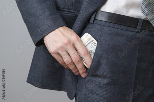 Businessman with money in studio