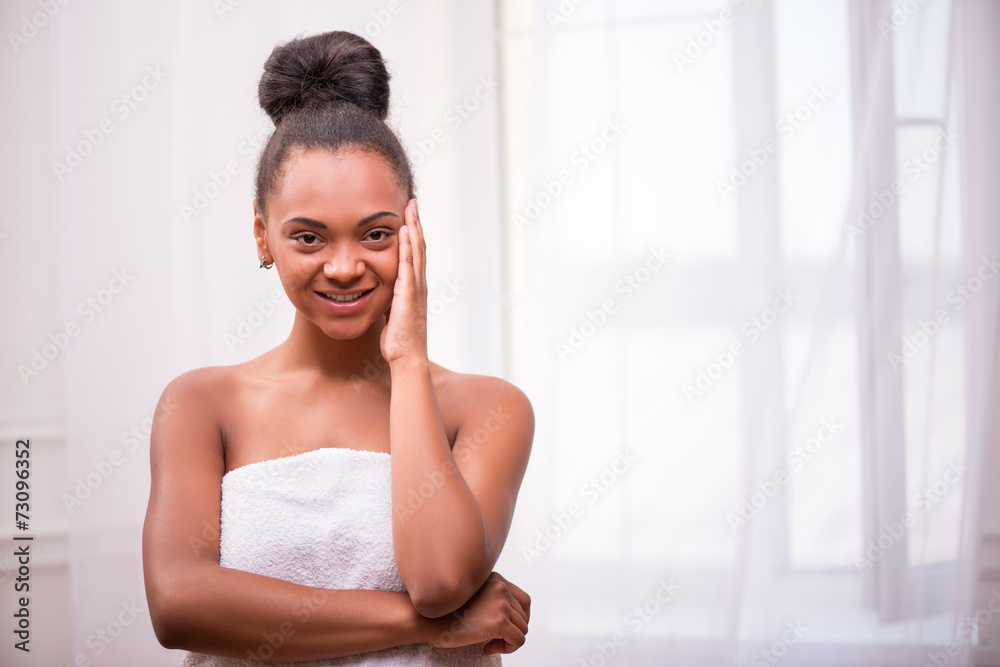 Beautiful dark skinned girl in white towel Beautiful dark skinned girl in white towel