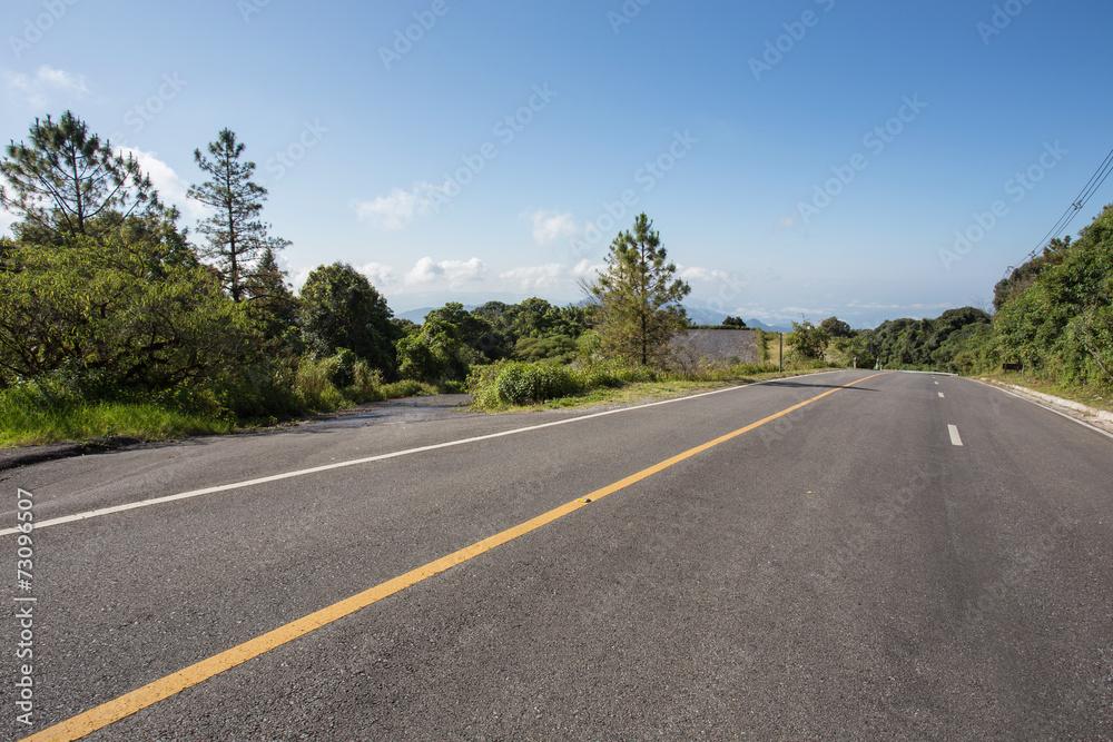 asphalt roadway with cloud blue sky background asphalt roadway with cloud blue sky background