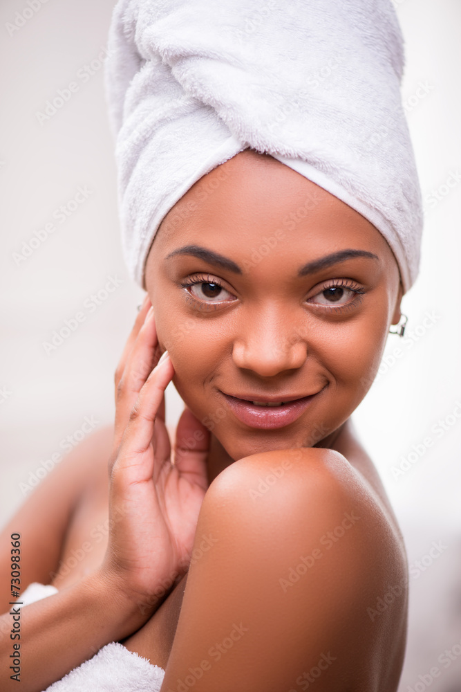 Beautiful dark skinned girl in white towel Beautiful dark skinned girl in white towel